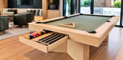 Contemporary Infinity Pool Table displayed in an upscale entertainment room with modern seating and natural light.