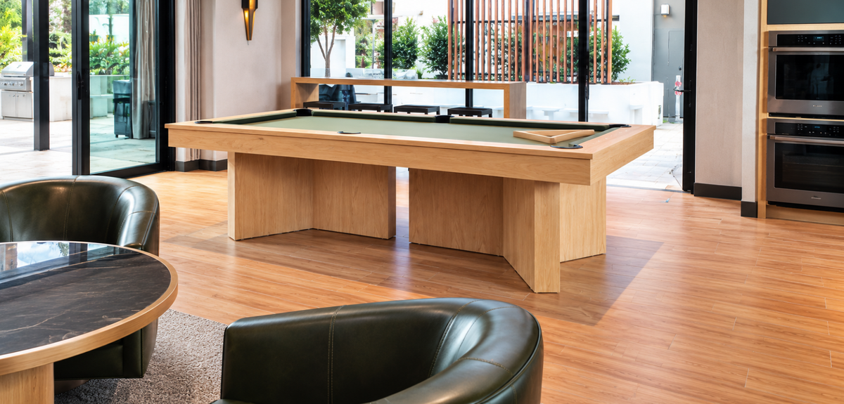 Wide view of the Contemporary Infinity Pool Table highlighting its minimalist design in a sophisticated residential interior.