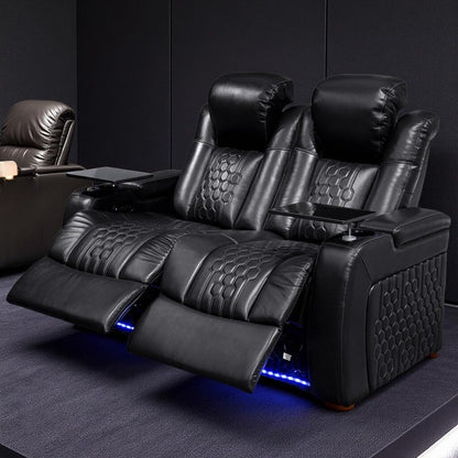 Black power reclining loveseat with tray table, cup holder, and blue LED lighting