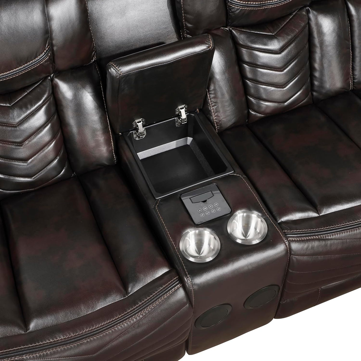 Sectional console with controls, cup holders, and concealed storage